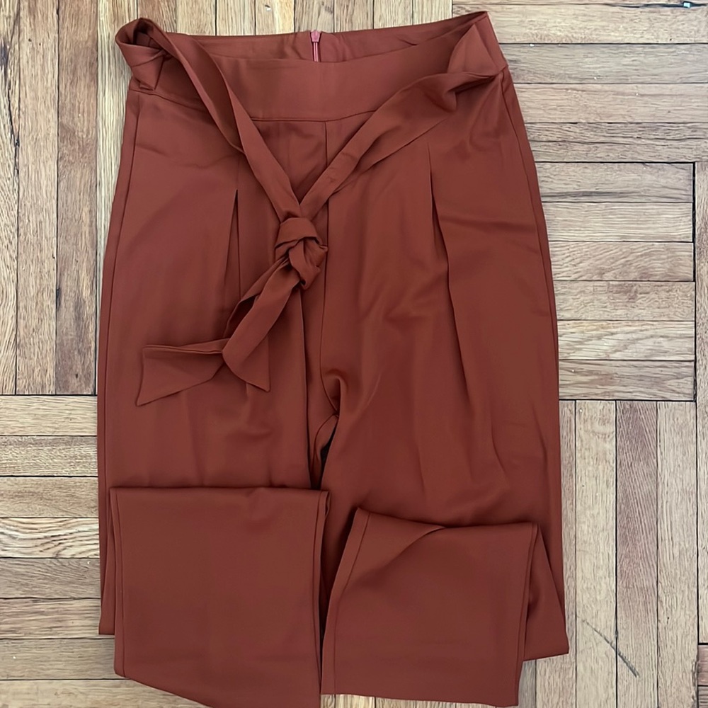 new never worn orange trouser pants size medium